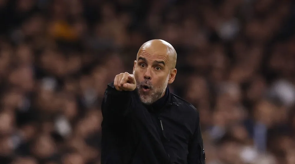  Soccer Football - UEFA Champions League - Real Madrid v Manchester City - Santiago Bernabeu, Madrid, Spain - December 10, 2025 Manchester City manager Pep Guardiola reacts Action Images via Reuters/Andrew Couldridge 