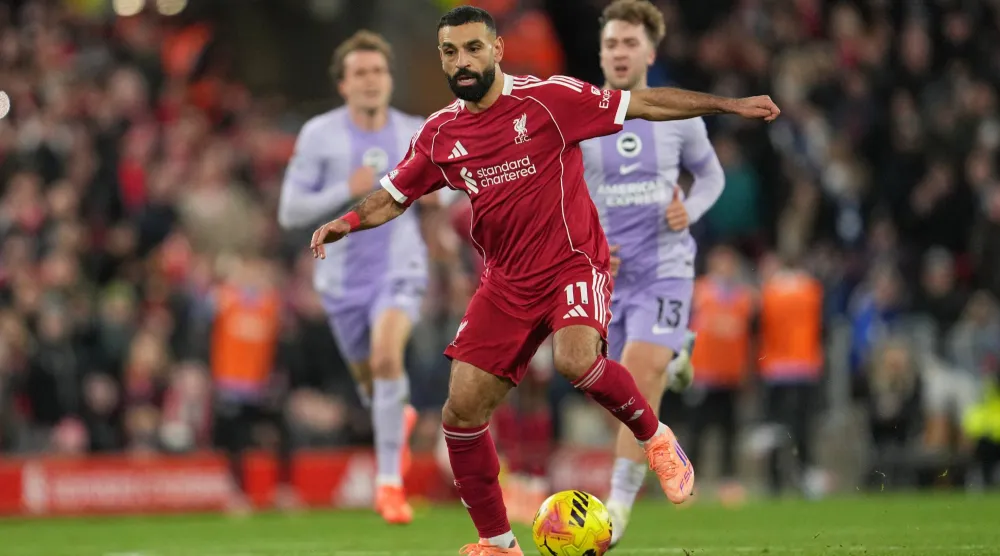 المصري محمد صلاح تألق في فوز ليفربول على برايتون (أ.ب)