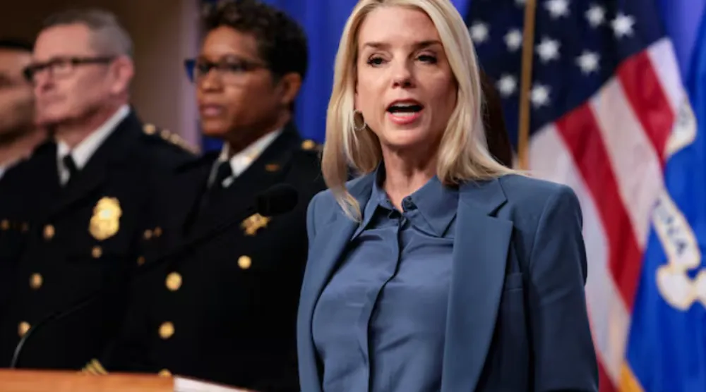 US Attorney General Pam Bondi speaks at a press conference following the arrest in the D.C. pipe bomber investigation, at the Justice Department in Washington, D.C., US, December 4, 2025. REUTERS/Jessica Koscielniak 
