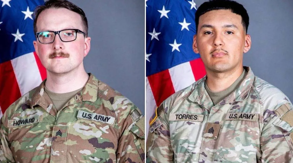  This undated combo photo created with images released by the Iowa National Guard shows Sgts. William Nathaniel Howard, left, and Edgar Brian Torres-Tovar. (Iowa National Guard via AP) 
