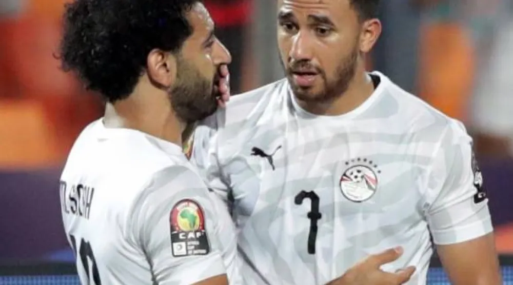 محمود حسن «تريزيغيه» ومحمد صلاح (كاف)