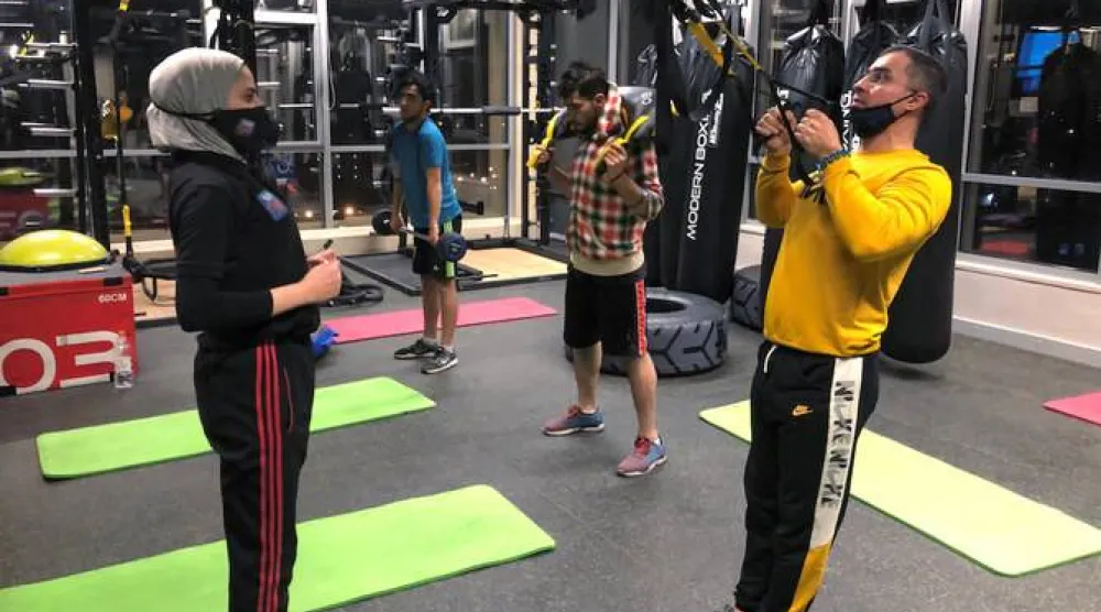 مواطنون يمارسون الرياضة في صالة رياضية في الأردن (أرشيفية - رويترز)