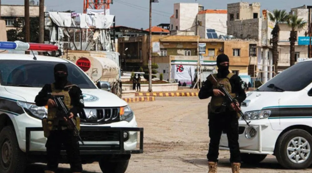 عنصران من الشرطة في سوريا (الشرق الأوسط)