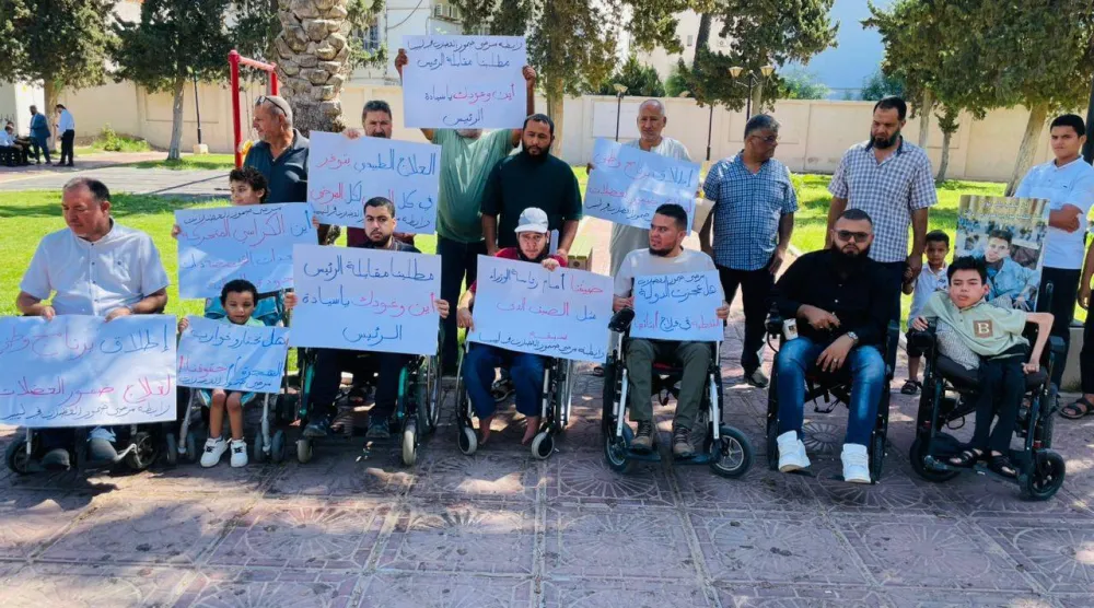 وقفة احتجاجية بالكراسي المتحركة لمرضى ضمور العضلات في طرابلس (رابطة ضمور العضلات)