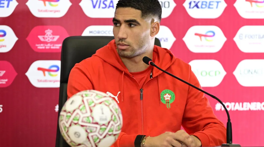  أشرف حكيمي لاعب المنتخب المغربي (إ.ب.أ)