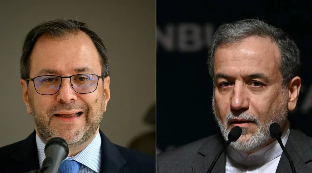 صورة مركبة لوزير الخارجية الفنزويلي إيفان خيل ونظيره الإيراني عباس عراقجي (ا.ف.ب)