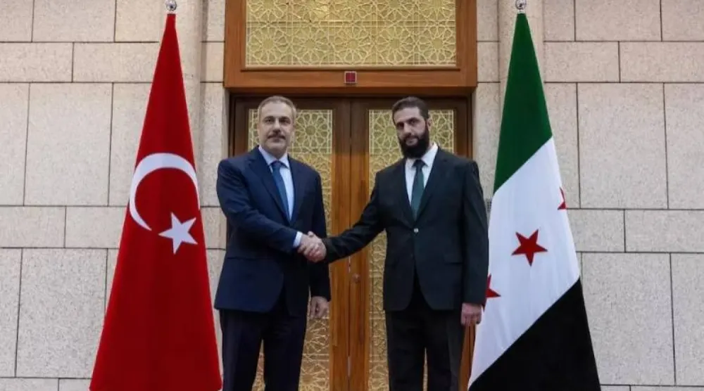 Şam’da bir araya gelen Ahmed Şara ve Hakan Fidan görüşmesinden bir kare  (Arşiv-Reuters)