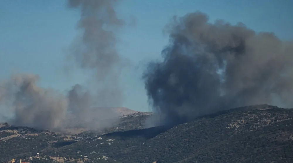 الدخان يتصاعد من موقع غارة إسرائيلية استهدفت جنوب لبنان في 18 ديسمبر (أ.ف.ب)