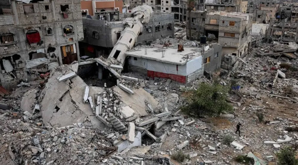 This overview shows a destroyed mosque and other buildings in Khan Younis in the southern Gaza Strip on October 7, 2024 on the first anniversary of the ongoing war in the Palestinian territory between Israel and Hamas. (AFP)

