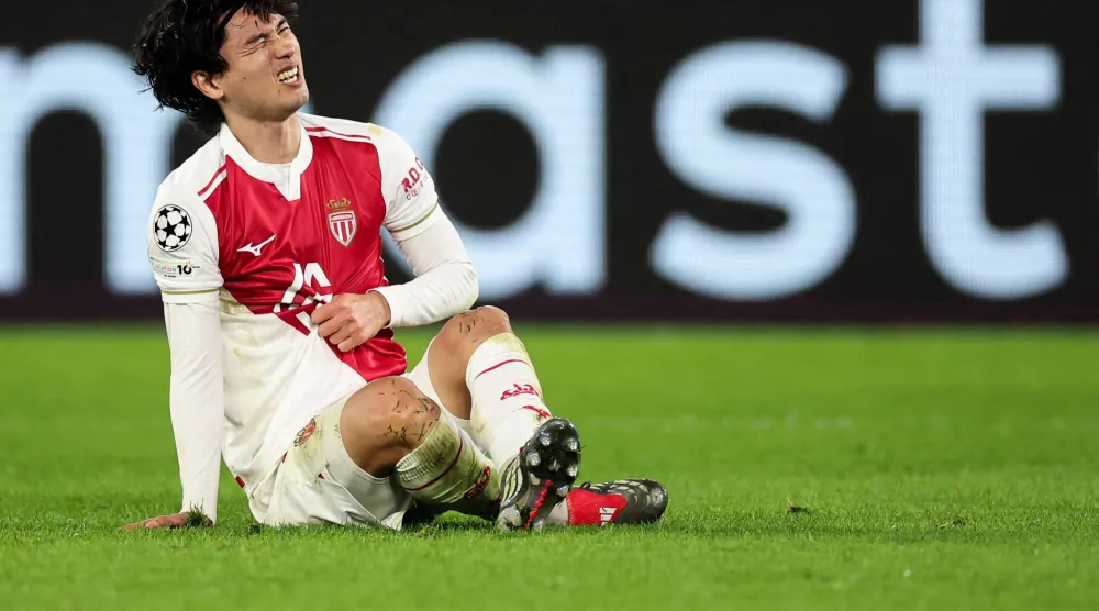 الياباني تاكومي مينامينو لاعب وسط موناكو (أ.ف.ب)