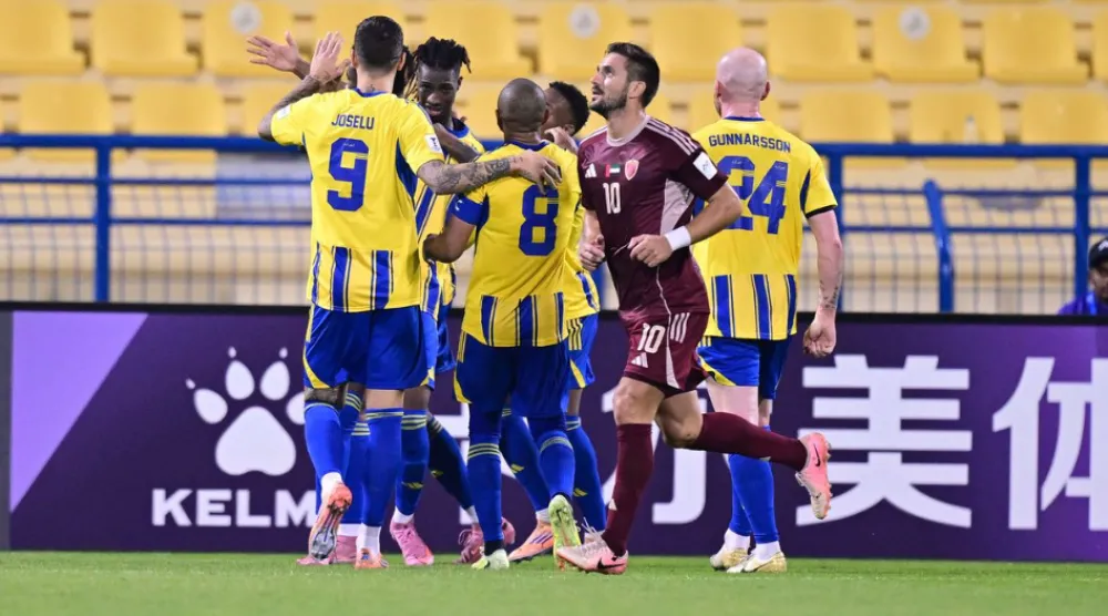 فرحة لاعبي الغرافة القطري بالفوز على الوحدة الإماراتي (الاتحاد الآسيوي)