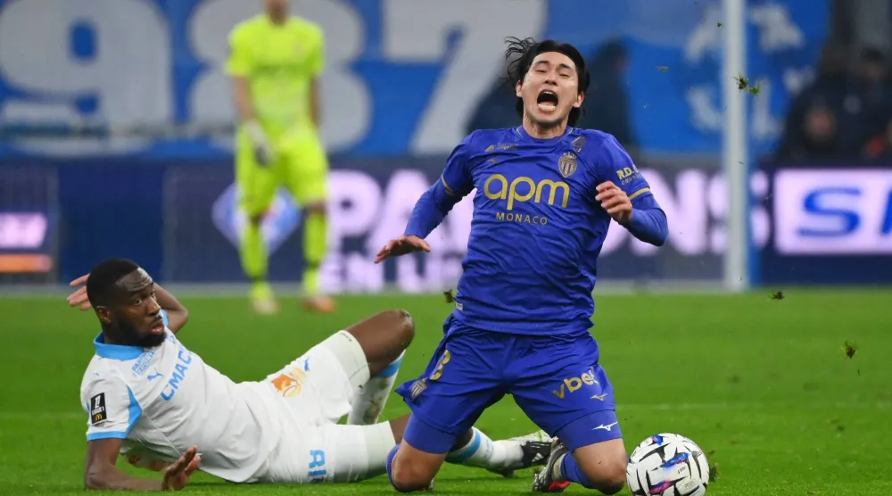 إصابة تاكومي مينامينو في الرباط الصليبي تضع مشاركته مع اليابان بكأس العالم محل شك (رويترز)