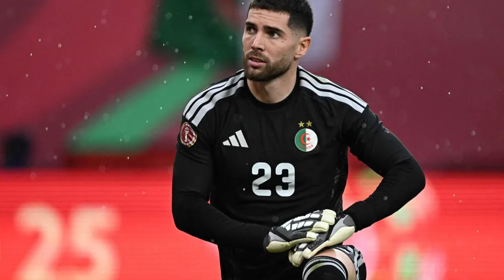  Algeria's goalkeeper #23 Luca Zidane reacts during the Africa Cup of Nations (CAN) Group E football match between Algeria and Sudan at Moulay Hassan Stadium in Rabat on December 24, 2025. (AFP) 