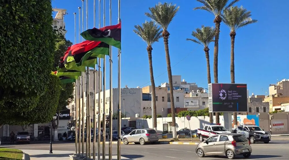 Libyan national flags fly at half-mast in Tripoli on December 24, 2025, after the head of Libya's armed forces and his four aides died in a plane crash in Türkiye. (AFP)