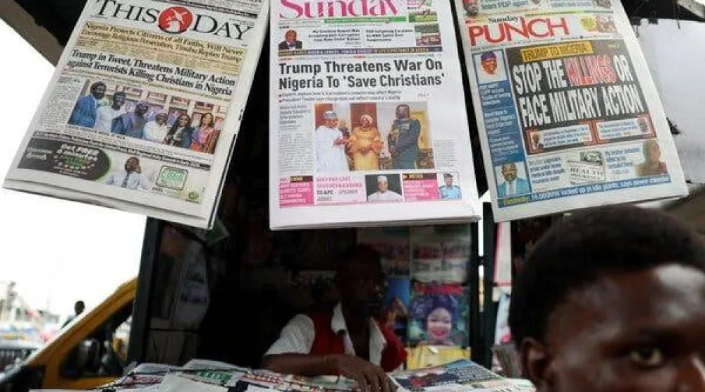 تصدرت تهديدات ترمب عناوين الصحف في لاغوس بنيجيريا يوم الأحد (رويترز)