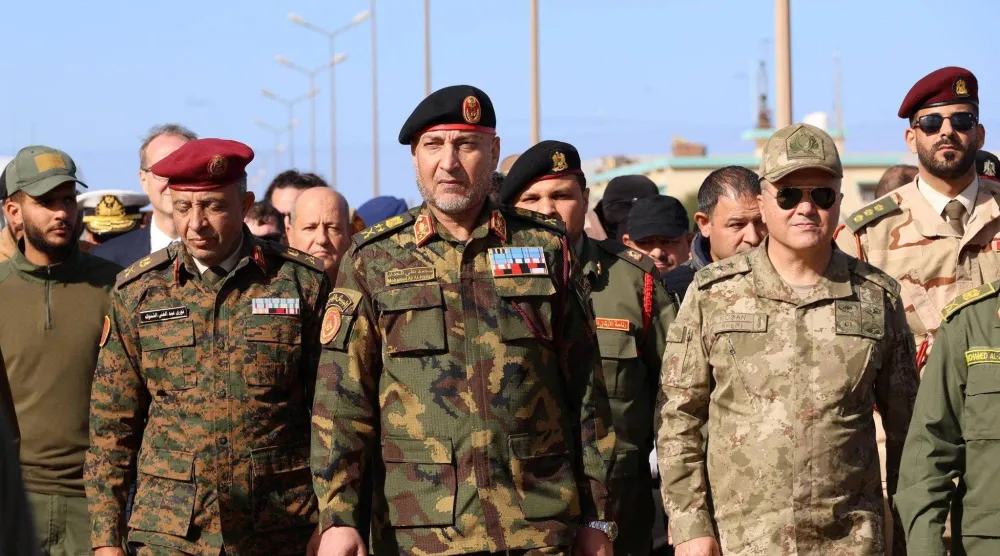 الحداد خلال حفل تخرج سابق لفوج جديد من الضباط في ثكنة الخمس العسكرية (رويترز)