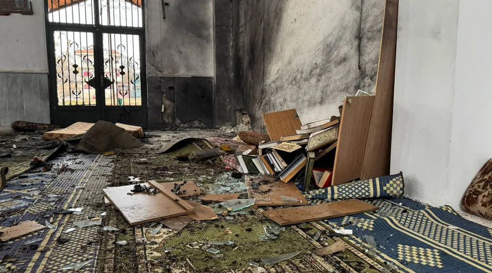 A view shows an interior of a damaged mosque after several people were killed in an explosion, as the Syrian Arab News Agency (SANA) said, in Homs, Syria December 26, 2025. REUTERS/Ali Ahmed al-Najjar 
