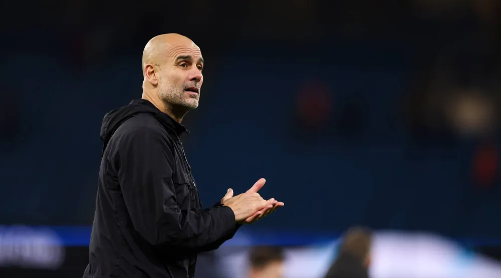 Manchester City manager Pep Guardiola greets supporters after winning the English Premier League match between Manchester City FC and West Ham United, in Manchester, Britain, 20 December 2025.  EPA/ALEX DODD