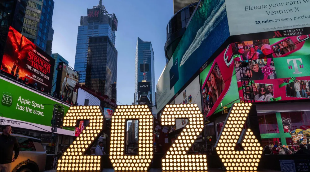 FILE - The 7-foot tall "2026" numerals are displayed at an illumination ceremony in Times Square, Thursday, Dec. 18, 2025, in New York. (AP Photo/Adam Gray, File)