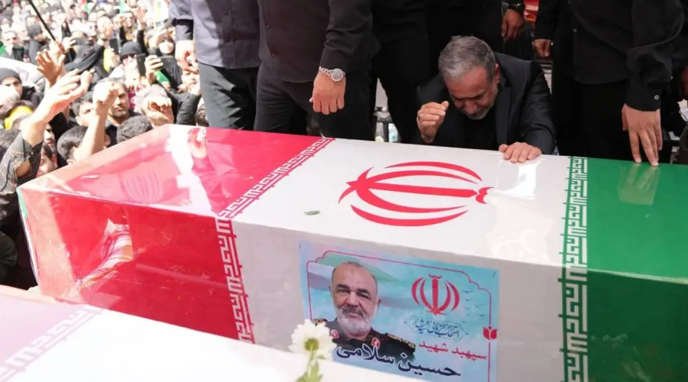 Iranian Foreign Minister Abbas Araghchi weeps over the coffin of Hossein Salami, commander of the Revolutionary Guard Corps, during the funeral of senior military officials killed in Israeli strikes in Tehran on June 28. AFP/Archive