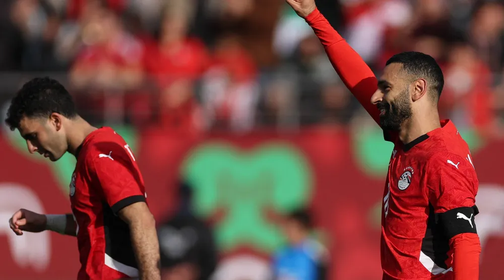 صلاح محتفلاً بهدفه في جنوب أفريقيا (أ.ف.ب)