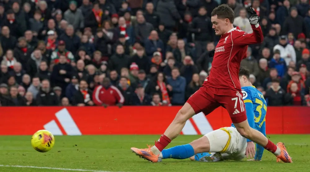 Liverpool's Florian Wirtz scores his side's second goal during the English Premier League soccer match between Liverpool and Wolverhampton Wanderers in Liverpool, Sunday, Dec. 27, 2025. (AP Photo/Ian Hodgson)