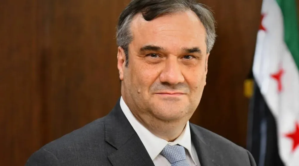 Syrian Central Bank Governor Abdulkader Husrieh (X)