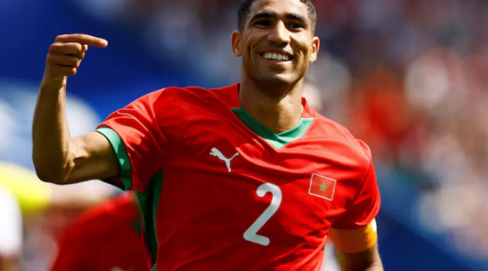 Paris 2024 Olympics - Football - Men's Quarter-final - Morocco vs United States - Parc des Princes, Paris, France - August 02, 2024. Achraf Hakimi of Morocco celebrates scoring their third goal. REUTERS