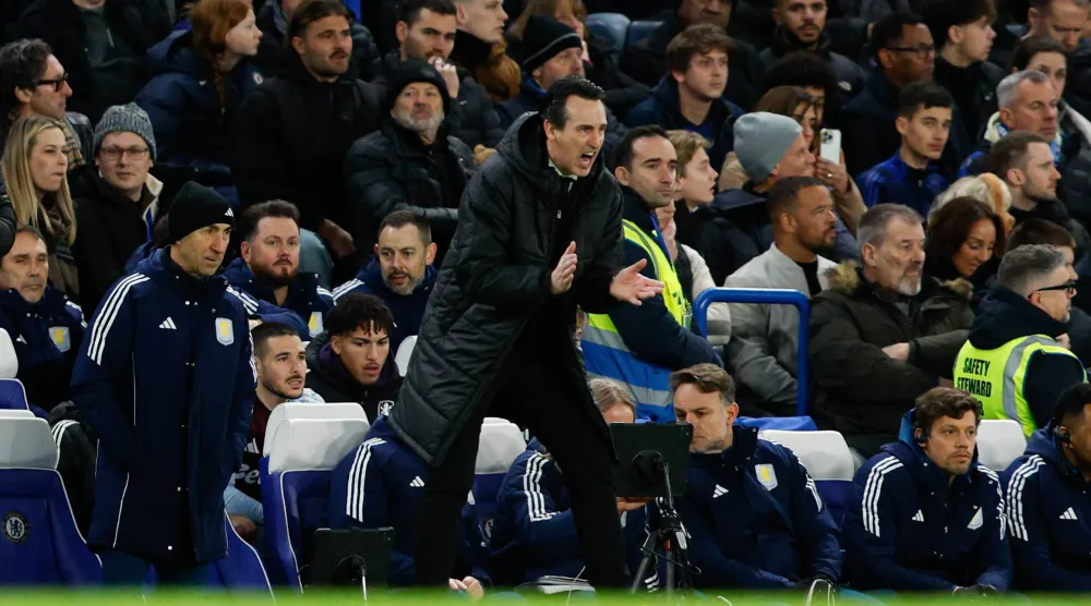 Aston Villa head coach Unai Emery reacts to his team's equalizer during the English Premier League match between Chelsea FC and Aston Villa, in London, Britain, 27 December 2025. (EPA)
