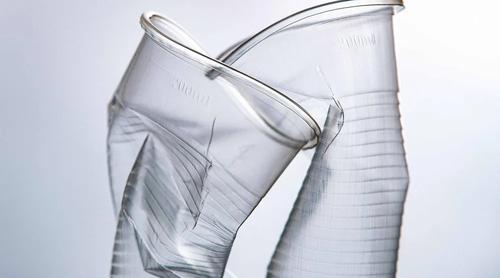 (FILES) An illustration photograph taken in Paris, on July 31, 2019 shows disposable plastics cups. (Photo by JOEL SAGET / AFP)
