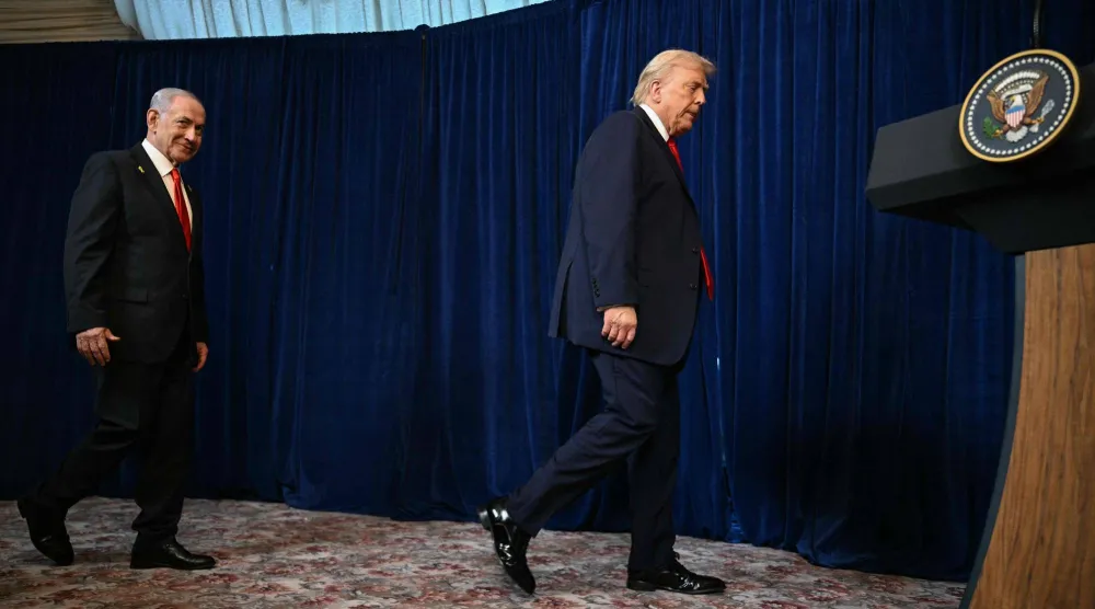 ترمب ونتنياهو على هامش مؤتمر صحافي مشترك في منتجع مارالاغو بولاية فلوريدا (أ.ف.ب)