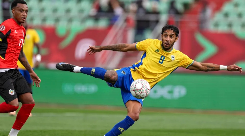  Gabon's forward #09 Pierre-Emerick Aubameyang scores a goal in front of Mozambique's defender #17 Edson Sitoe during the Africa Cup of Nations (CAN) Group F football match between Gabon and Mozambique at Grand Stadium in Agadir on December 28, 2025. (AFP)