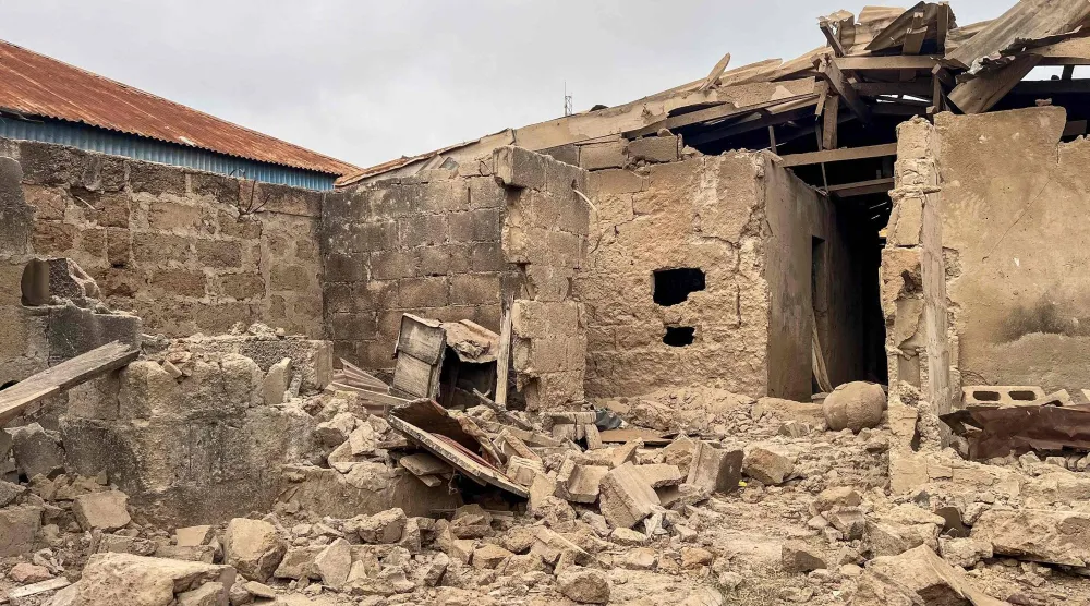 دمار خلّفته الضربة الأميركية في قرية أوفا بولاية كوارا النيجيرية يوم 27 ديسمبر (أ.ف.ب)