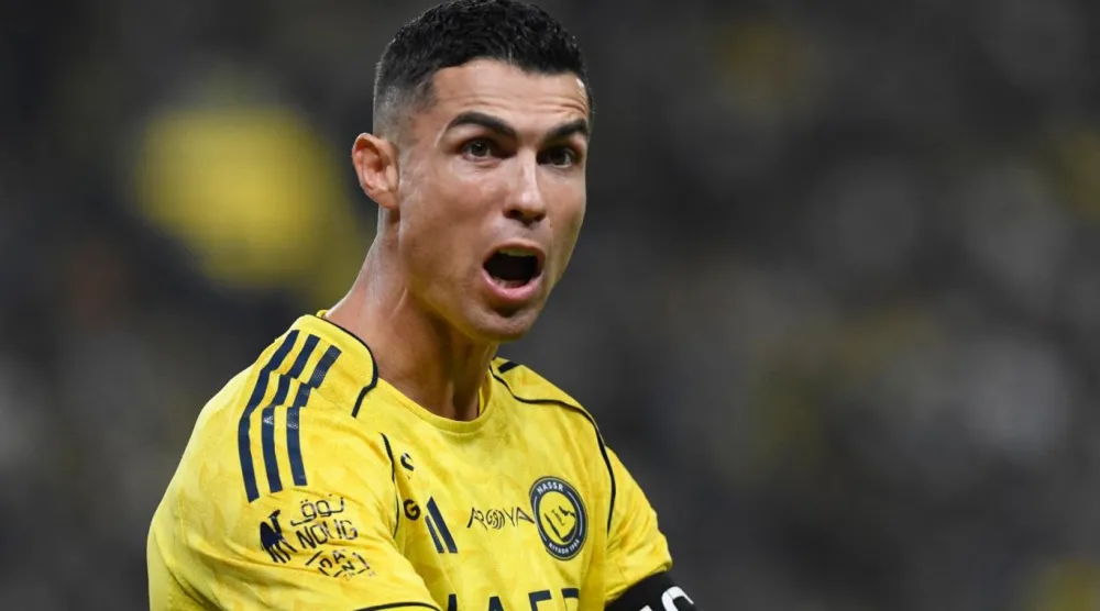 Al Nassr oyuncusu Cristiano Ronaldo, Al Okhdood'a karşı oynadıkları maçta (Reuters)