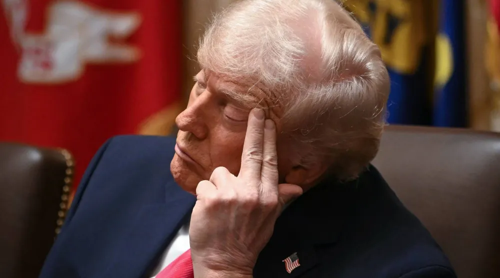 ترمب في اجتماع مجلس الوزراء بالبيت الأبيض يوم 2 ديسمبر 2025 (أ.ف.ب)