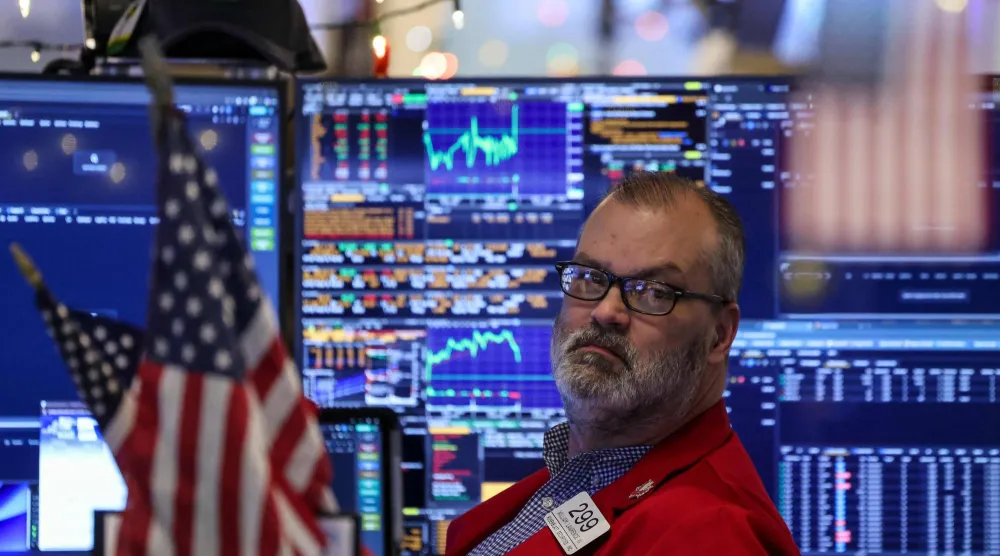 متداول يعمل في بورصة نيويورك (أ.ف.ب)