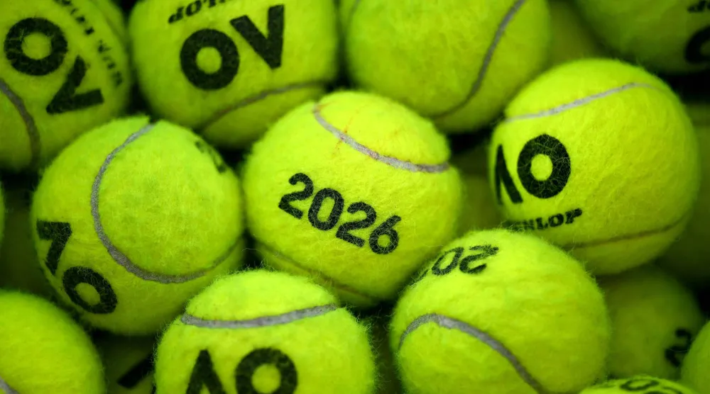 This picture shows tennis balls outside a court during a training session ahead of the United Cup tennis tournament in Sydney on January 2, 2026. (Photo by Saeed KHAN / AFP)