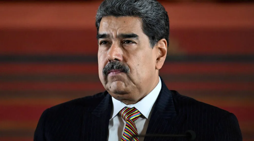 (FILES) Venezuela's President Nicolas Maduro looks on during a meeting at the National Assembly in Caracas on August 22, 2025. (Photo by Juan BARRETO / AFP)