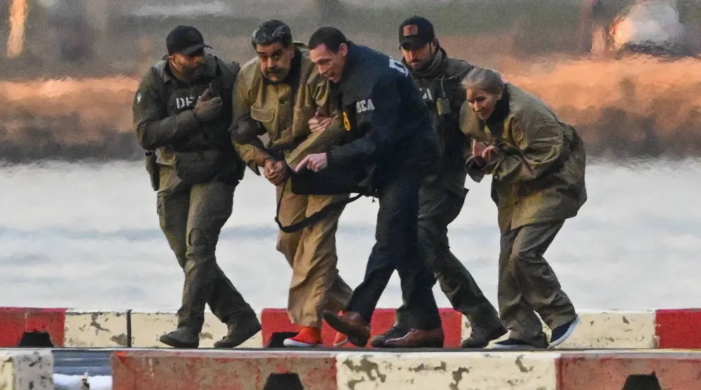 Captured Venezuelan President Nicolas Maduro and his wife, Cilia Flores, arrive at the Wall Street Heliport during their transport to the federal courthouse for their arraignment in New York, New York, USA, 05 January 2026. (EPA)
