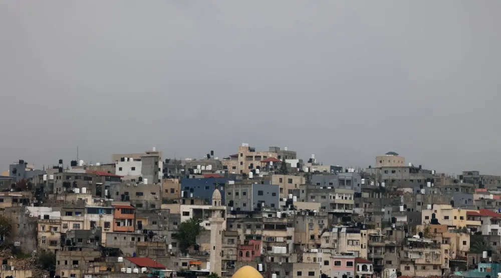 Batı Şeria'daki Tulkarm kenti yakınlarındaki Nur Şems mülteci kampında askeri operasyon sırasında çekilmiş binaların fotoğrafı (EPA)
