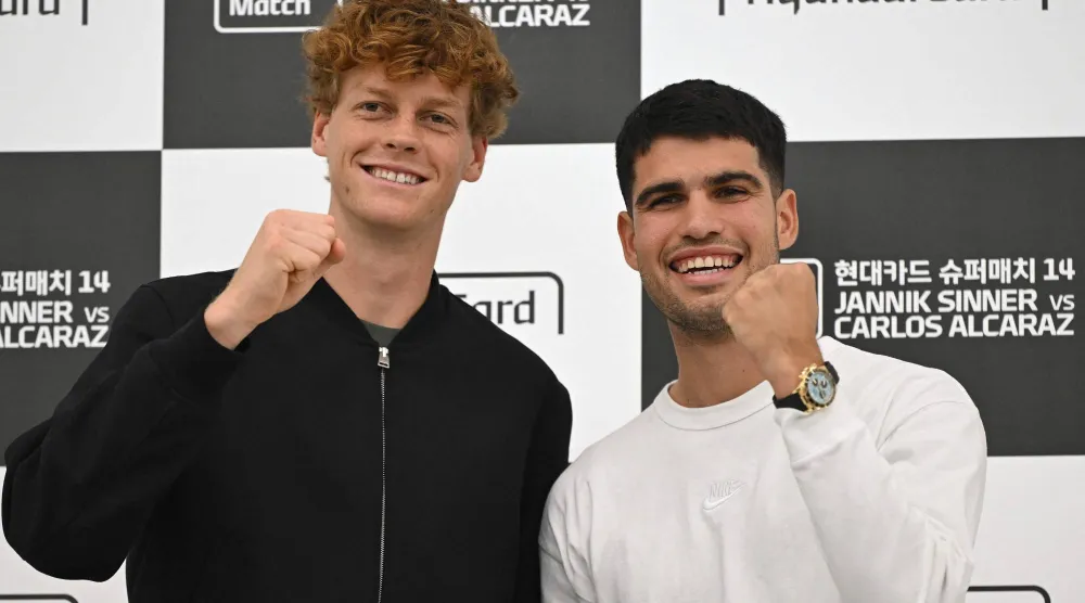 الإسباني كارلوس ألكاراس والإيطالي يانيك سينر في سيول (أ.ف.ب)