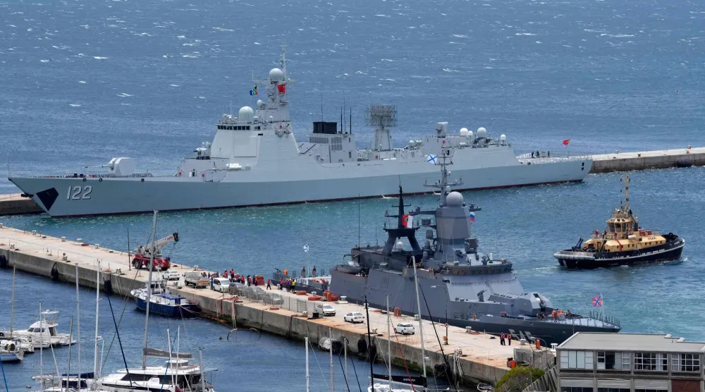  The Chinese guided-missile destroyer Tangshan, left, and the Russian corvette Stoikiy, right, in the Simon's Town harbor, in Cape Town, South Africa, Friday, Jan. 9, 2026. (AP) 