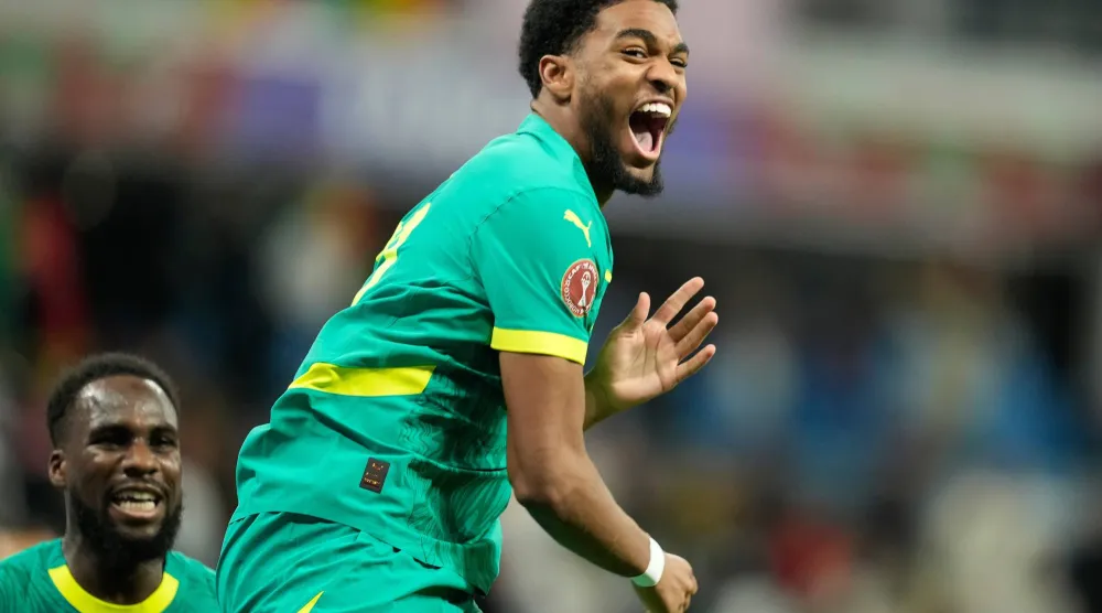 Senegal's Ibrahim Mbaye celebrates after scoring during the Africa Cup of Nations best of 16 soccer match between Senegal and Sudan in Tangier, Morocco, Saturday, Jan. 3, 2026. (AP)