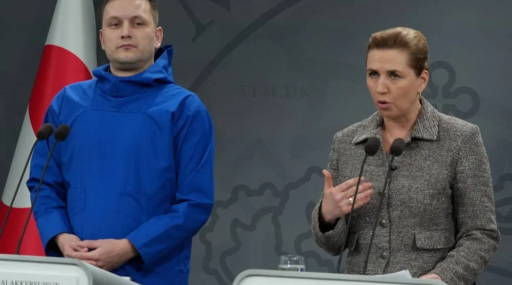 Danish Prime Minister Mette Frederiksen and Greenlandic Prime Minister Jens-Frederik Nielsen attend a press conference in Copenhagen, Denmark, January 13, 2026. (Reuters) 