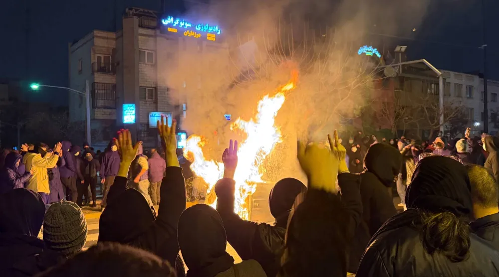  In this photo obtained by The Associated Press, Iranians attend an anti-government protest in Tehran, Iran, Friday, Jan. 9, 2026. (UGC via AP)