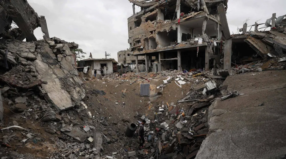 A general view shows destruction in the Bureij camp in the central Gaza Strip on January 9, 2026 following Israeli attacks. Gaza's civil defense agency said Israeli attacks in the Palestinian territory killed at least 13 people, including five children, despite a ceasefire that has largely halted the fighting. (AFP)