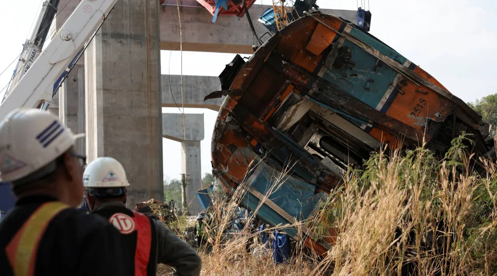 Wreckage at the site where a train was derailed when a construction crane collapsed and fell onto its carriages, causing several casualties, in Sikhio district, Nakhon Ratchasima province, Thailand, January 14, 2026. (Reuters)