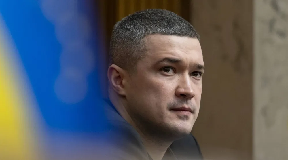 Ukraine's newly appointed Defense Minister Mykhailo Fedorov attends a parliamentary session in Kyiv, Ukraine, 14 January 2026. (EPA)