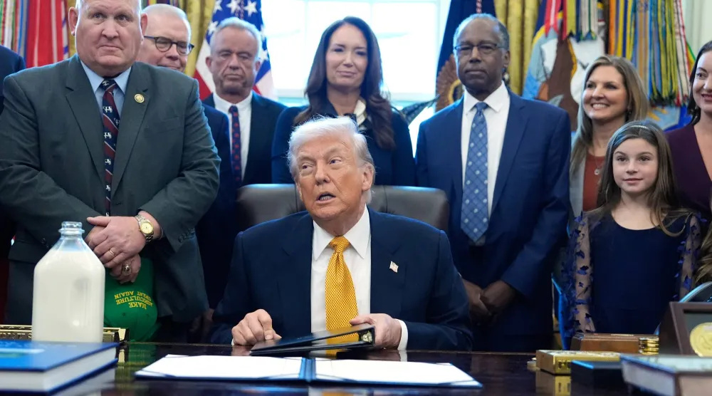 President Donald Trump speaks in the Oval Office of the White House, Wednesday, Jan. 14, 2026, in Washington. (AP Photo/Alex Brandon)
