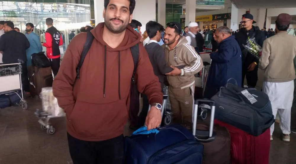  A Pakistani medical student Arslan Haider waits at the airport after arriving from Tehran on a commercial flight amid the ongoing nationwide protests in Iran, in Islamabad, Pakistan, January 15, 2026. (Reuters)